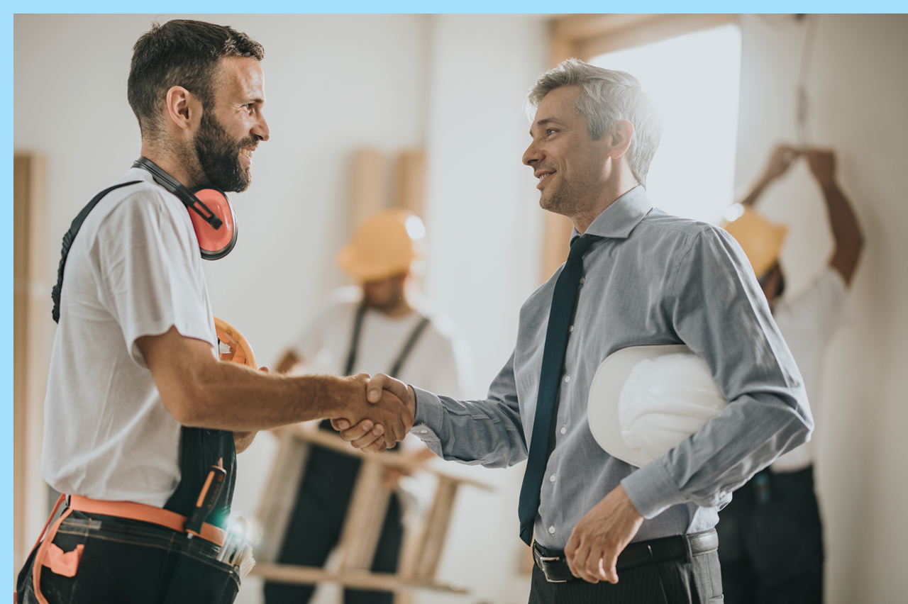 construction worker and owner striking a deal